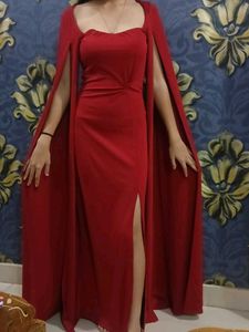 Elegant Red Gown with Cape Sleeves