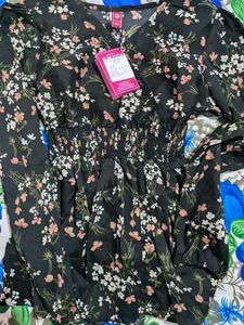 Black floral peplum top