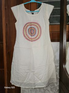 A Beautiful Cream Color Cotton Kurti