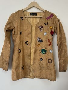 Our custom Neha Kakkar jacket in gold