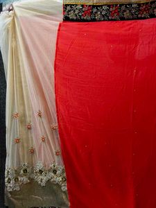 Elegant coral colour saree with blouse