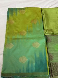 Green banarasi zari suit.
