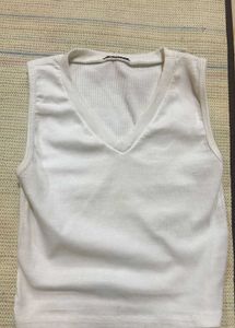 A White V Neck Top.