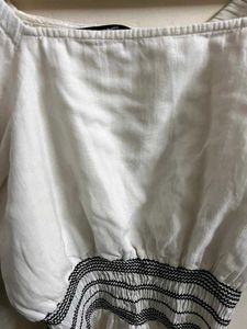 White Smocked Peplum Top