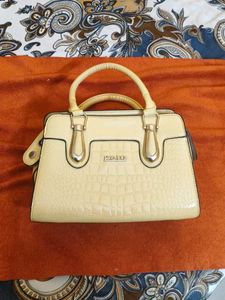 butter yellow handbag