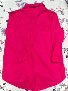 oversized pink shirt.