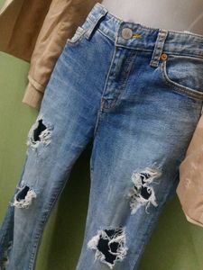 Ripped &amp; Distressed Denim Jeans