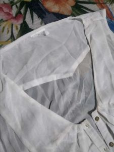 White Sleeveless Blouse