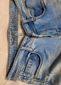 Light Wash Distressed Denim Jeans