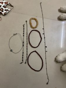one necklace 5 anklets 1 bracelet
