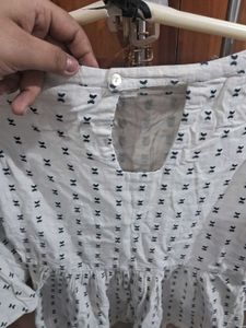 Patterned Peplum Top