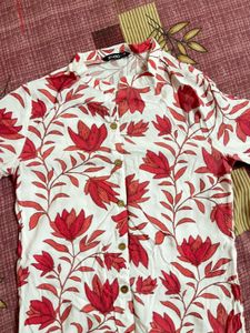 White Kurti with pink coloured Lotus on it