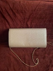 Sparkling Silver Clutch cum sling with chain👛