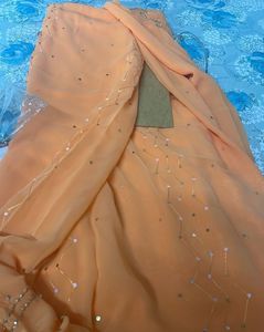 Beautiful New Packed Saree. Orange Peach Colour