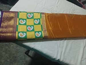 Golden Saree With Blue Pallu