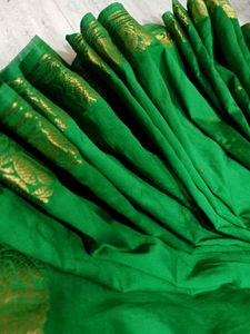 Elegant Green Saree with Golden Border