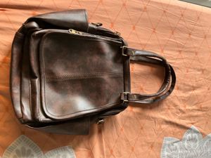 Stylish Brown Multi Way Handbag - Backpack.