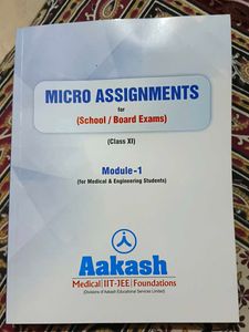 Aakash Class XI question practice book.