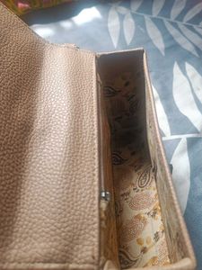 Elegant Wallet with Braided Strap