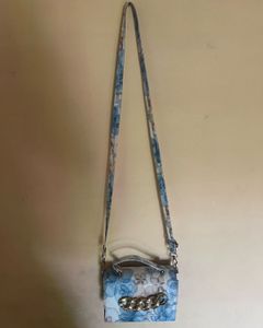 FLORAL PRINT SLING BAG