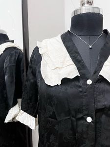 Black Shirt With White Lace Collar