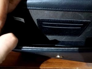 spacious black sling bag