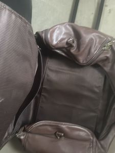 Leather Rolling Suitcase