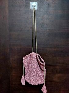 Loose Cloth Purse In the Colour Mauve - Straps Present - Tie-up Closure