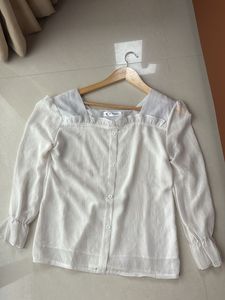 White Ruffle Blouse