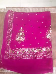 Ambroider saree with blouse.