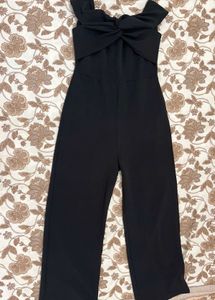 Elegant Black Strapless Jumpsuit with Bow Detail
