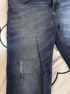 Distressed Denim Jeans