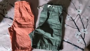 Two Boys Orange and green Shorts