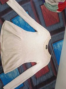 Elegant Pearl Embellished Peplum Top