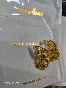 golden peacock jhumkas