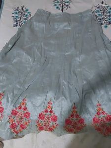 A beautiful grey lehenga with pink detailing