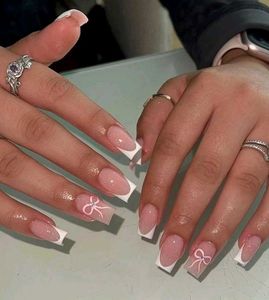 Burgundy Bow and Star Nails
