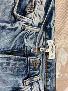 Distressed Denim Jeans