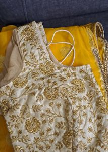 Yellow Border Saree With Golden Blouse