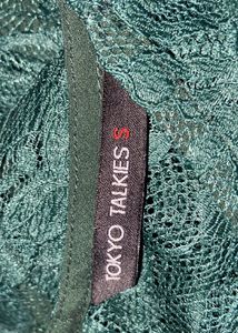 Tokyo Talkies Top In Dark Green Colour with mesh.