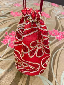 Red Potli With Sequence Work