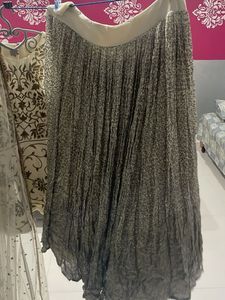 cream full hand work Chaniya choli wid net dupatta