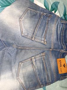 Distressed Denim Jeans
