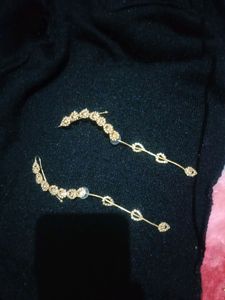 pretty golden color earrings . good looking for party wear outfits.