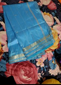 Woman Silk saree with stitched blouse