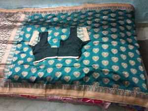 Embellished Banarasi Saree With Patterned Blouse.