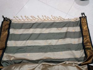 Beige Colour Saree With black &amp; Golden Border.