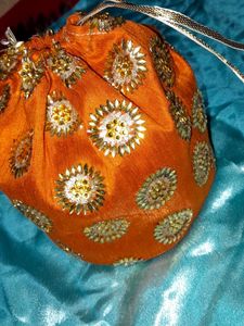 Potli Bag Wit Beautiful Golden Work