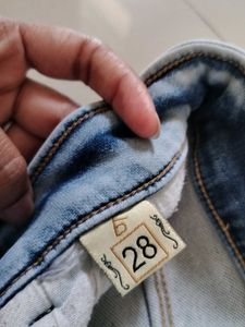 Light Wash Distressed Skinny Jean