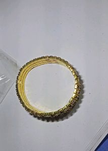 Stone Fitted Golden Bracelet